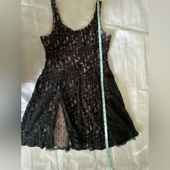 Disney Minnie Rocks the Dots black w/light pink lace dress size large
Pre loved - Picture 2 of 7